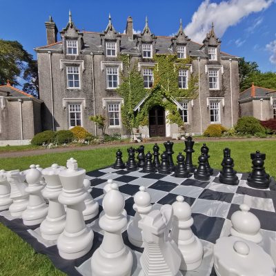 Giant chess in front of Plas Cilybebyll manor house