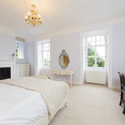Large king sized bedroom in manor house